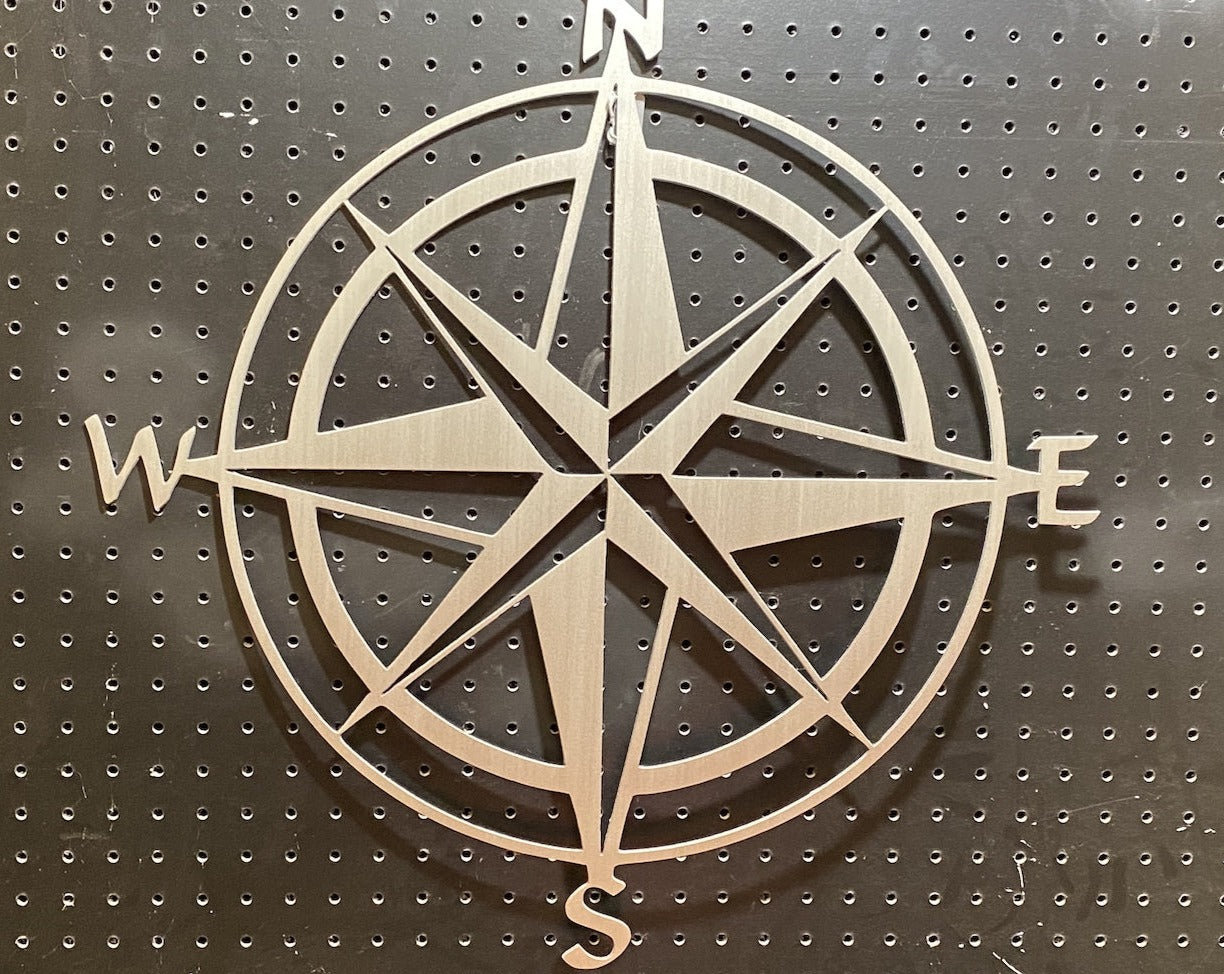 Metal Wall Art of a Compass Rose Symbol