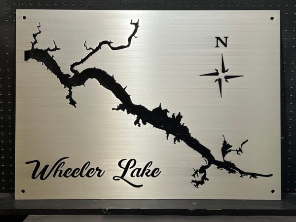 Wheeler Lake custom metal map with compass rose, displayed on a black pegboard.