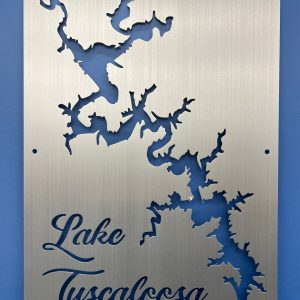 Lake Tuscaloosa custom metal cutout map with elegant script, mounted on a blue wall.