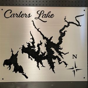 Carters Lake custom metal map with compass rose on a perforated black background.