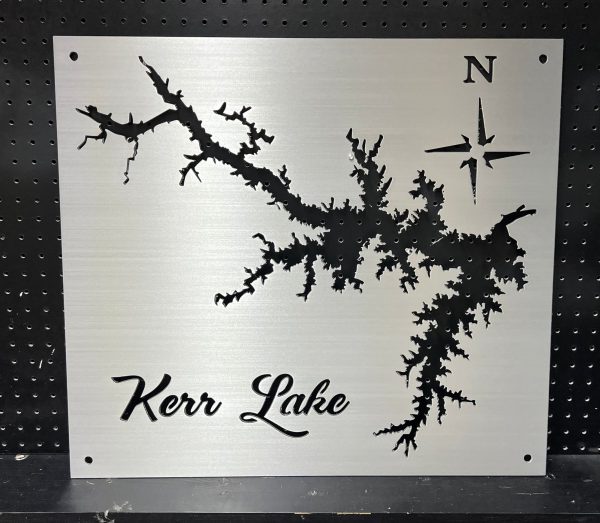 Kerr Lake metal map with compass design on a brushed background, mounted on a perforated black wall.