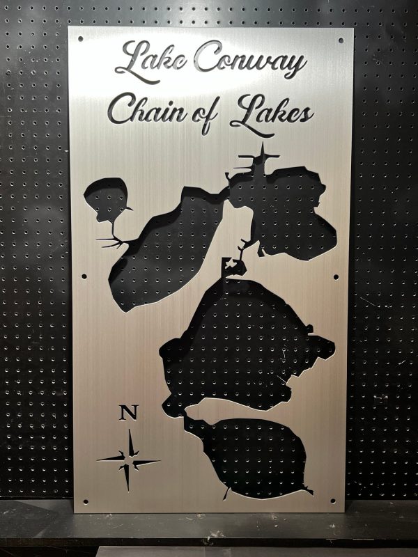 Lake Conway Chain of Lakes custom metal map with compass rose on a perforated background.