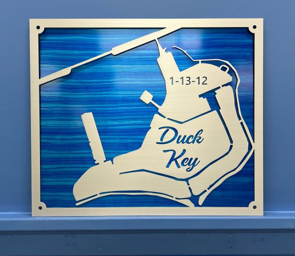 Duck Key Custom Lake Map with date 1-13-12 on a blue background, mounted on a wall.