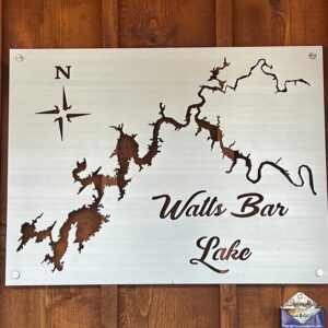 Watts Bar Lake metal map with compass rose on brushed silver, mounted on a wooden wall.