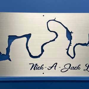 Nick-A-Jack Lake metal map with compass rose, mounted on a blue wall.