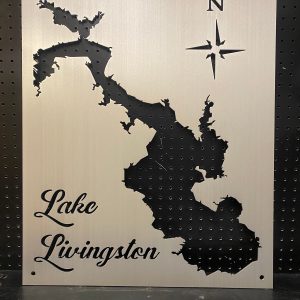 Lake Livingston metal map with compass rose on a perforated black background.