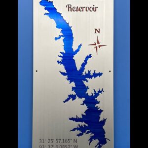 Toledo Bend Reservoir metal map with coordinates and compass rose, mounted on a blue wall.