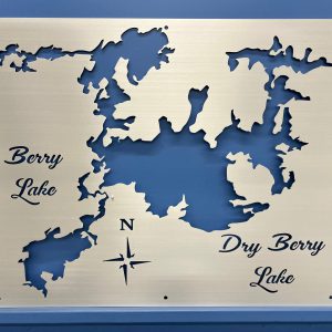 Berry Lake and Dry Berry Lake custom metal map with compass rose on brushed surface.