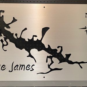 Lake James map sign with intricate lake outline and compass rose on brushed metal.