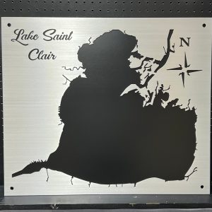 Lake Saint Clair custom metal map with compass rose on a brushed silver background, mounted on a black pegboard.