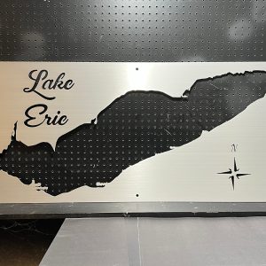 Lake Eric custom metal sign with map cutout and compass rose, mounted on a perforated background.