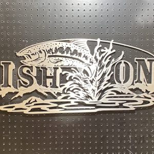 Metal sign with "Fish On" text and a fish jumping out of water, set against a perforated backdrop.