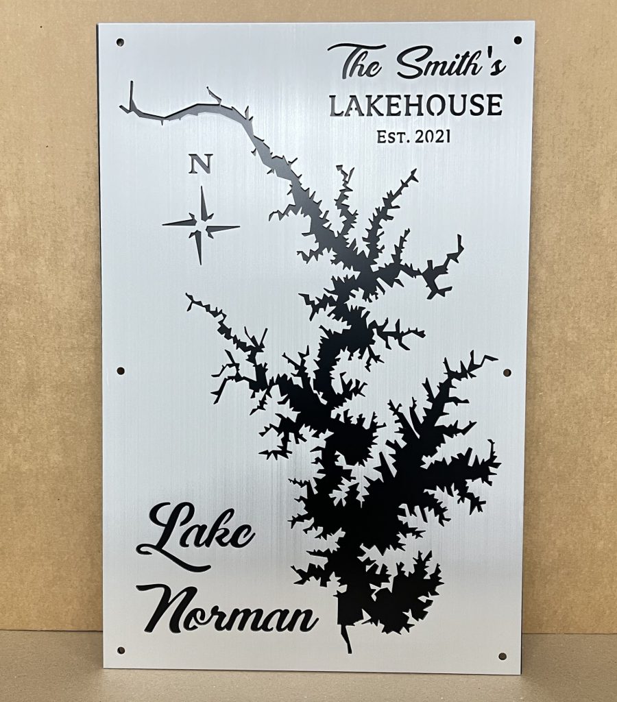 Lake Norman custom metal sign with "The Smith's Lakehouse Est. 2021" and a compass rose.