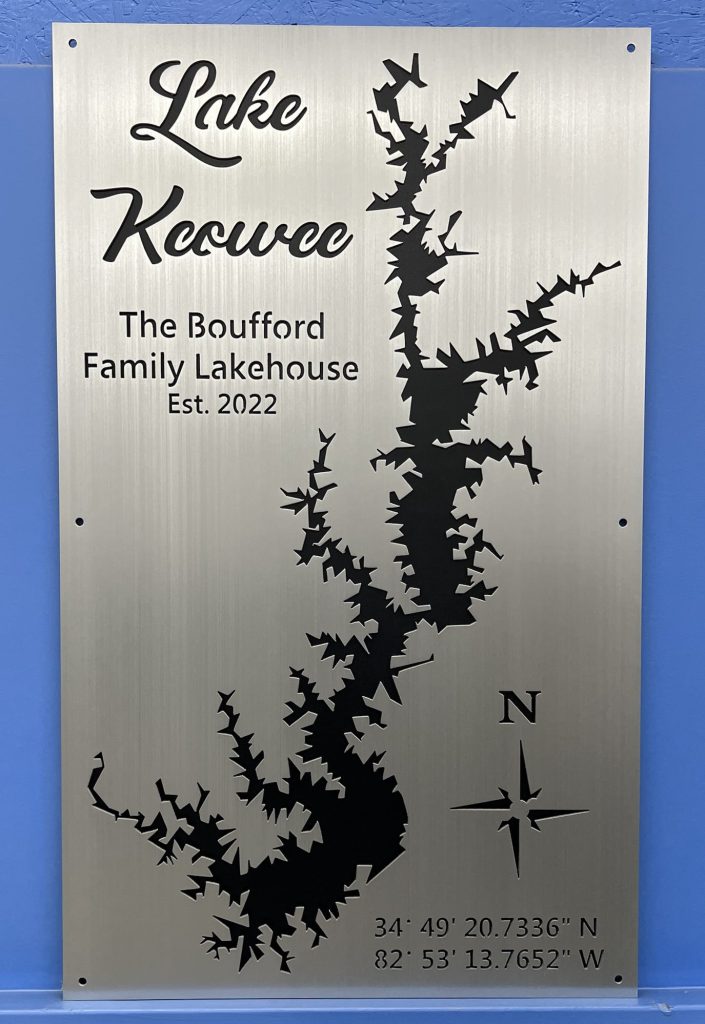 Lake Keowee metal sign for The Boufford Family Lakehouse, Est. 2022, with coordinates and compass rose design.