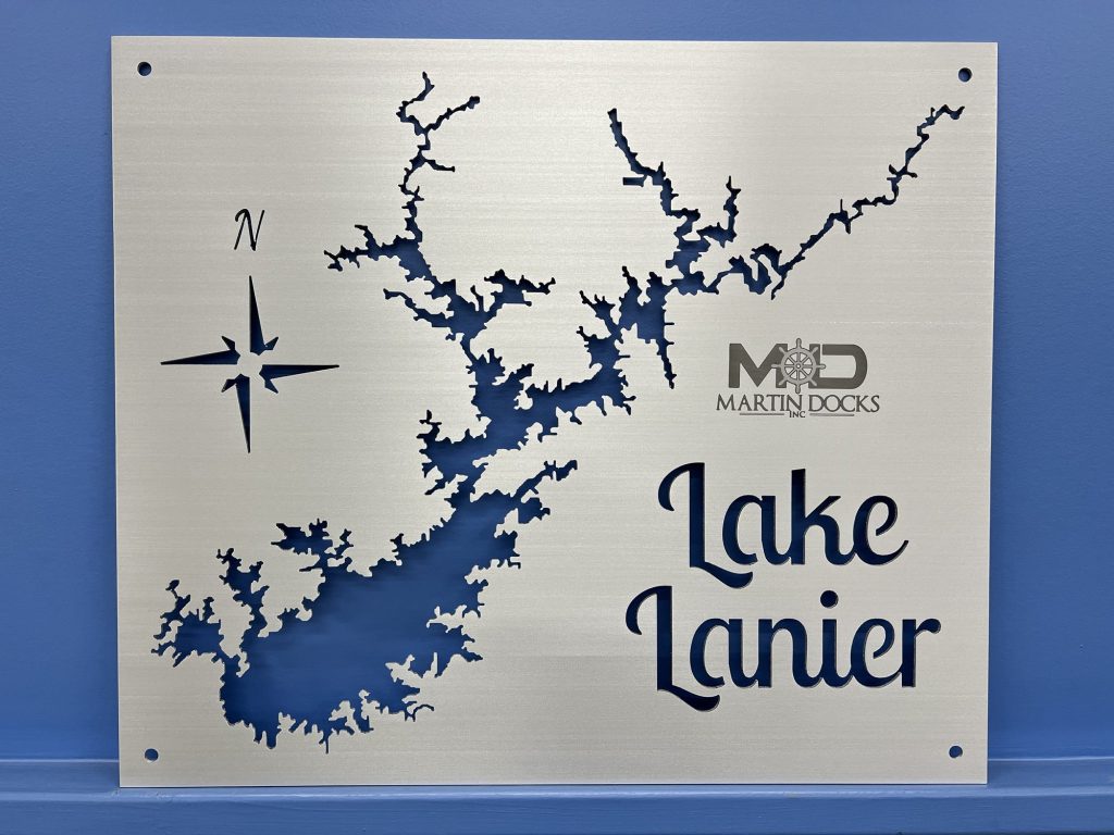 Lake Lanier metal map with compass rose and Martin Docks logo on a blue wall.